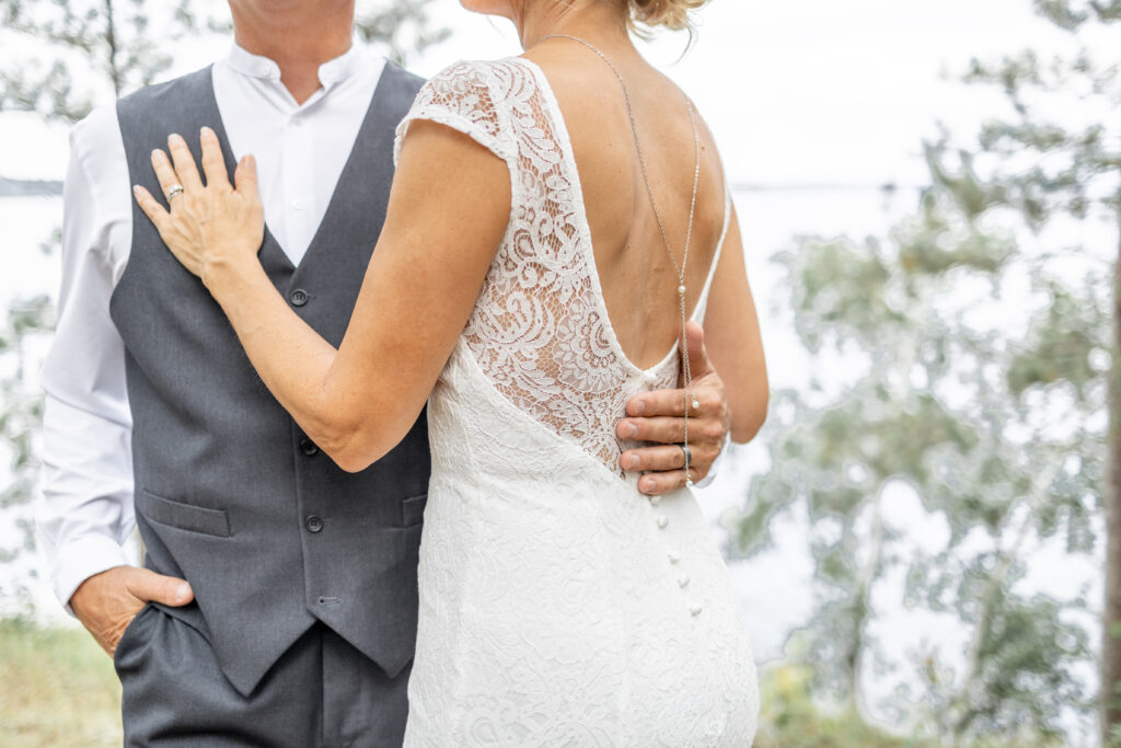 Gorgeous bridal gown and groom's outfit photographed by a Brainerd wedding photographer