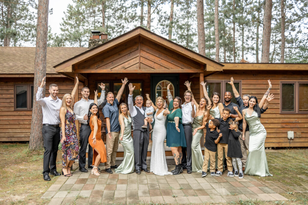The bride and grooms blended family are photographed by the Brainerd wedding photographer