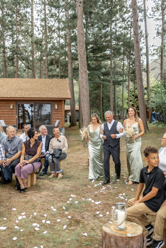 The groom walking down the aisle photographed by the Brainerd wedding photographer